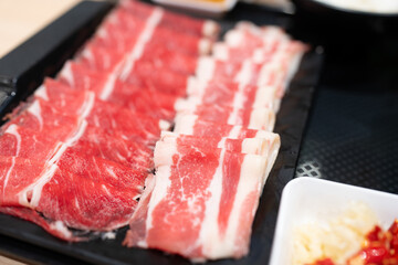 Premium fresh sliced meat beef and raw pork for Shabu shabu or sukiyaki.