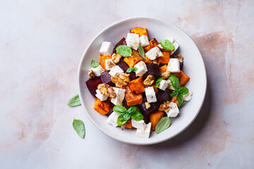 Salad with sweet potato, beetroot, feta and walnuts.