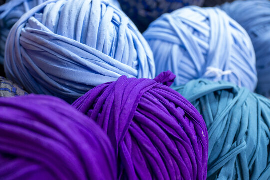 Colorful yarn balls of recycled fabric for knitting and crafts