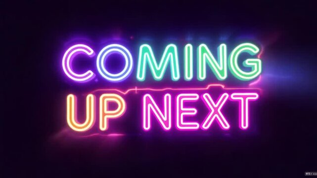 Neon sign graphic displaying the words "Coming Up Next".