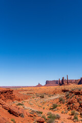 Dry Riverbed in Monument Valley with Rock Columns in Background,USA