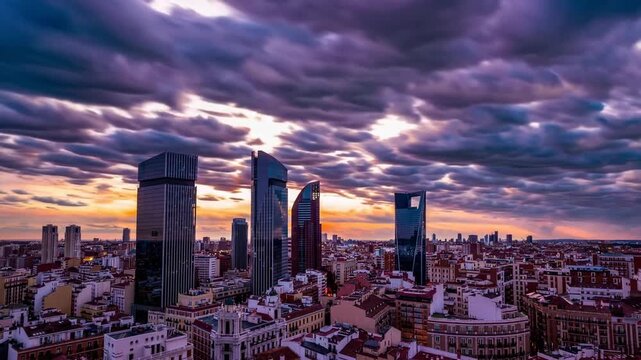 dynamic timelapse cityscape graph featuring the modern skyscrapers and skyline of Madrid