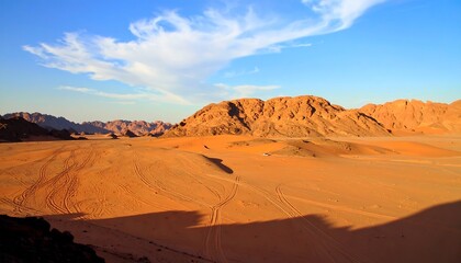 Naklejka premium Desert landscape with mountains and clouds
