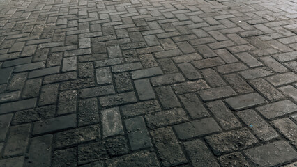Closeup view on old town paving stone at night days