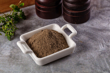 Ground dry black pepper powder
