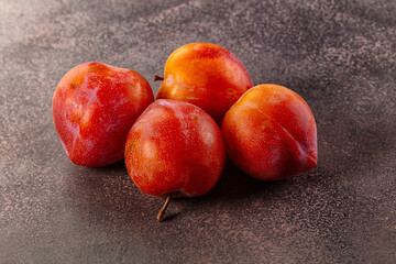 Ripe sweet juicy fresh purple plums