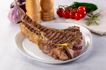 Grilled ribeye beef steak with bone