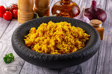 Indian yellow curry rice with tumeric