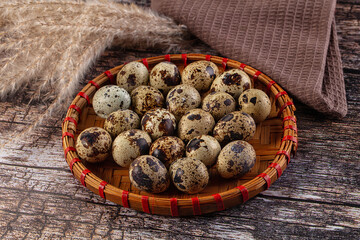 Raw brown quail egg heap