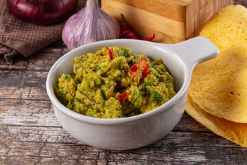 Green spicy Mexican guacamole dip