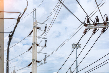 Fototapeta premium A large high-voltage electric pole with a beautiful sky in the background, electric wires, high voltage, electric pole