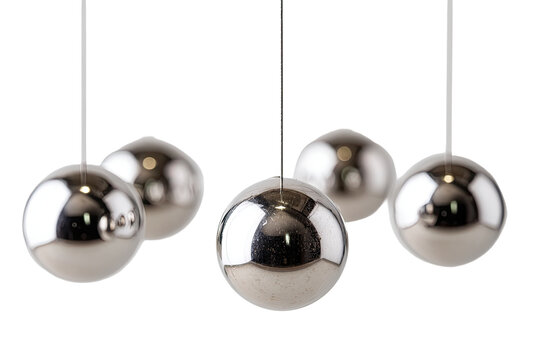 Shiny metal balls suspended - Powered by Adobe