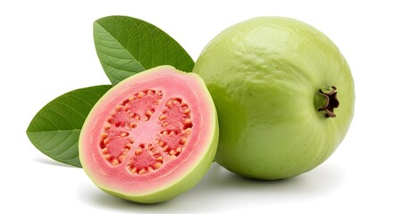 Photo of fresh pink guava cut in half revealing juicy flesh and seeds, next to a whole green guava and leaves, isolated on white background