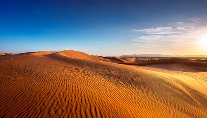 expansive golden sand dunes under the clear blue sky in the vast desert landscape during sunset generative ai