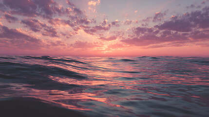 Fototapeta premium tranquil seascape with calm ocean water hazy pink sky at sunset or sunrise peaceful outdoor landscape scenic horizon serene reflection nature and relaxing travel concept