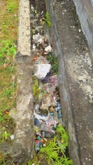 Garbage and Plastic Waste in Drainage Canal
