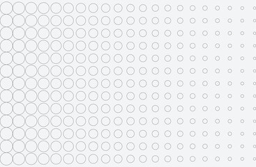 The image is a grid of black-outlined circles on a light gray background. The circles are arranged in rows and columns. They are large on the left side of the image and progressively decrease in size.