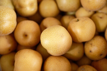 Basket full of fresh juicy pears