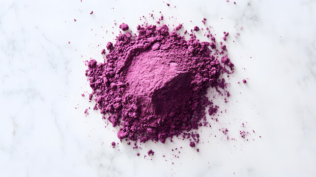 Vibrant purple sumac powde spread out on a white surace, showcasing its fine txture and color, perfect fr a food styling shot.