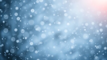 Fototapeta premium Gentle snowfall in soft illumination, evoking quiet winter mood.