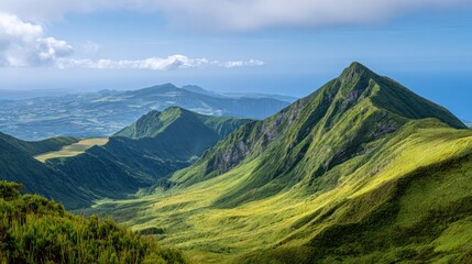 Mountain Vista: A picturesque panorama of rolling hills and jagged mountain peaks under a vast sky, offering an immersive perspective of natural beauty and the serene majesty of untouched landscapes.