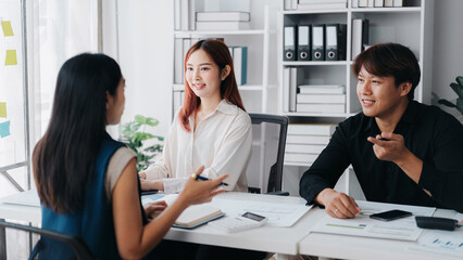 Asian Business Team Meeting Collaboration Brainstorming Strategy Ideas in Modern Office | Young Entrepreneurs Discussing Project Startup at Workplace