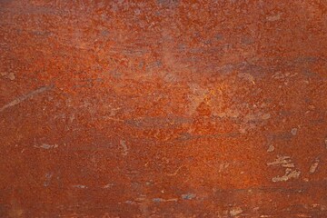 Background, texture metal sheet covered with a layer of rust