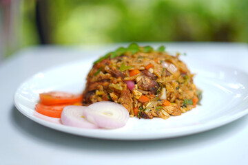 Traditional Sri Lankan Chicken Kottu Roti with Fresh Vegetables.