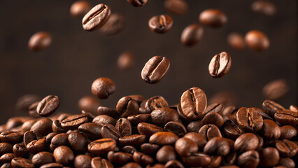 numerous dark roasted coffee beans scattered in mid-air against a blurred, dark brown background, emphasizing their glossy texture and rich color
