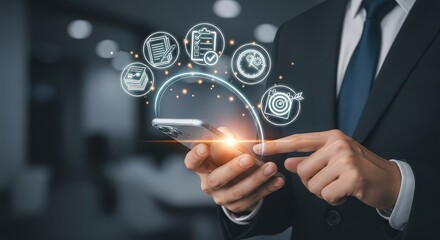Businessman interacts with futuristic digital interface showing business icons and data visualization