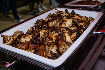 Grilled chicken served in a white dish