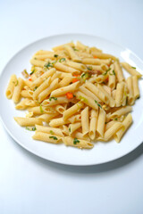plain pasta plate on white background