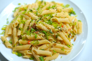 delicious pasta plate on white