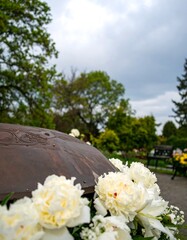 Floral display on memorial
