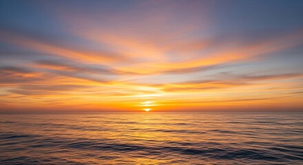 Obraz premium Golden Sunset Over Ocean: Serene Waters, Fiery Sky, Tranquil Horizon.