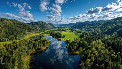 Obraz premium Panoramic view of a valley with a serene lake