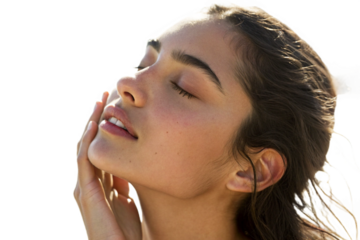 Close up portrait of a beautiful young woman with her eyes closed, touching her face, isolated on transparent background, showcasing healthy and radiant skin