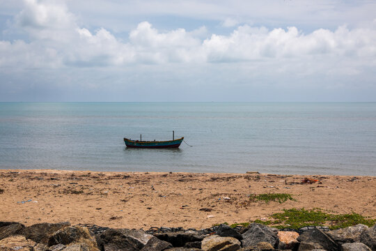Wooden fishing boats in sea - Rameshwaram, Tamil Nadu, India