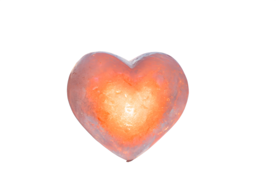 Glowing heart shaped object isolated on white background