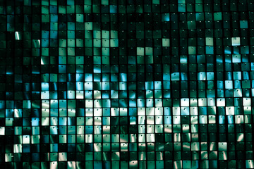 Wind Driven Shimmer Wall, Square metal reflectors shining