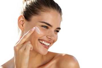 Beautiful young woman applying cream on her face isolated on transparent background, showcasing her radiant skin and healthy beauty routine