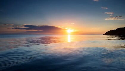 Obraz premium sunset reflection over calm sea