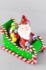 Christmas table composition. Beautiful decoration. Christmas trees, candles, stars, lights and elegant accessories. Merry Christmas and Happy Holidays, Template.