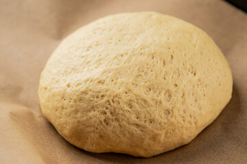 Dough raw cooking yeast, flour, water tasty snack fresh delicious gourmet food background on the table rustic food top view copy space