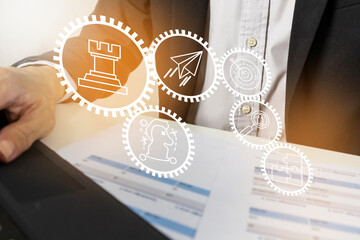 Strategy concept, Businessman plans investment strategies, selects available resources with goals...