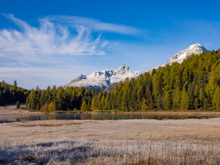 St. Moritz, Switzerland - October 6th 2024: Idyllic lake Lej da Staz in the morning sunlight