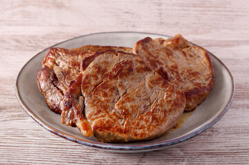  beef tenderloin chops on plate
