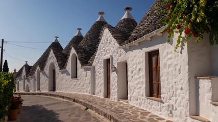 Traditional Trulli Stone Huts with Conical Roofs in Alberobello, Puglia