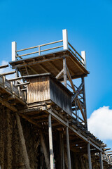 Fototapeta premium Traditional Salt Mine Structure in Germany with Wooden Architecture under Blue Sky