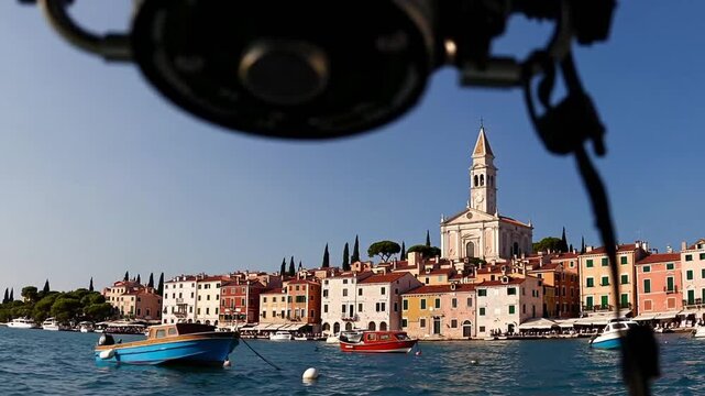 Scenic Harbor View of Coastal Town with Prominent Baroque Church Towering Over the City